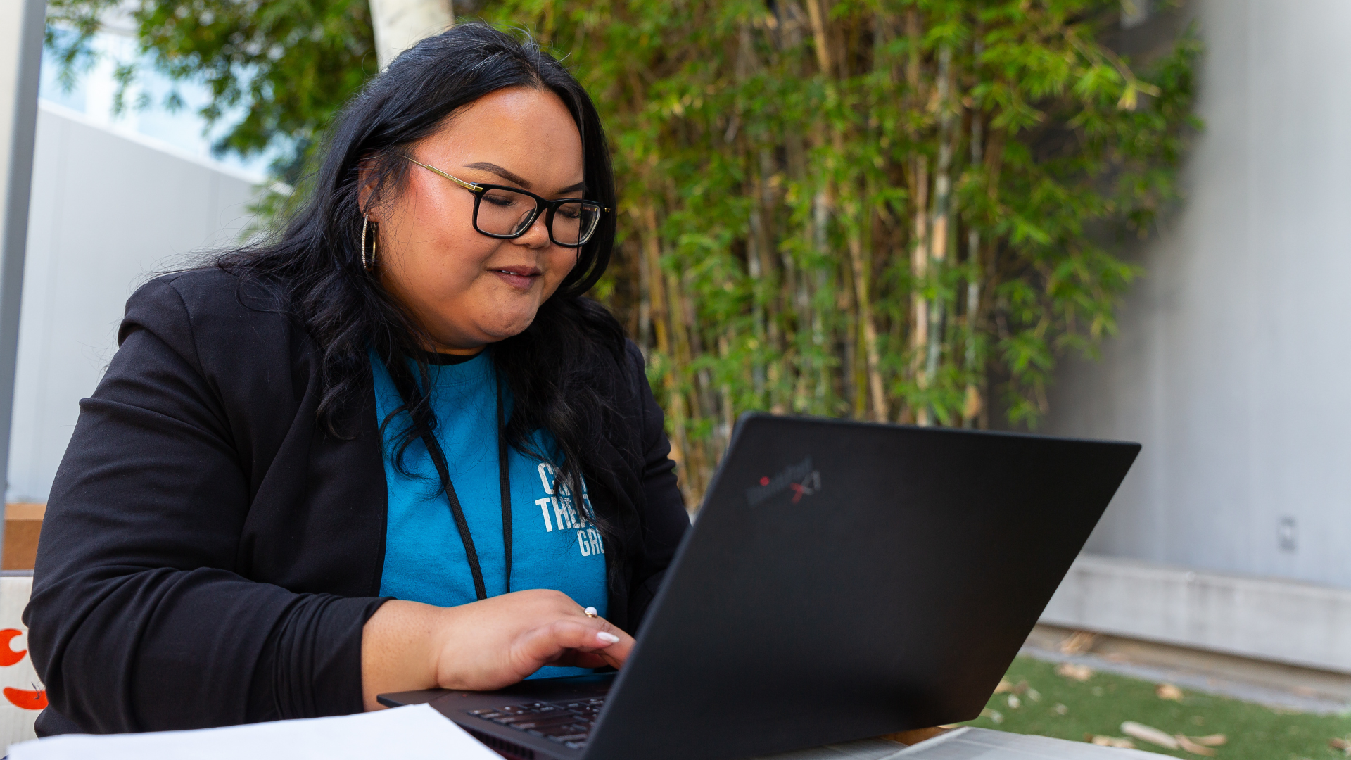 A CTG staff member on a computer. 