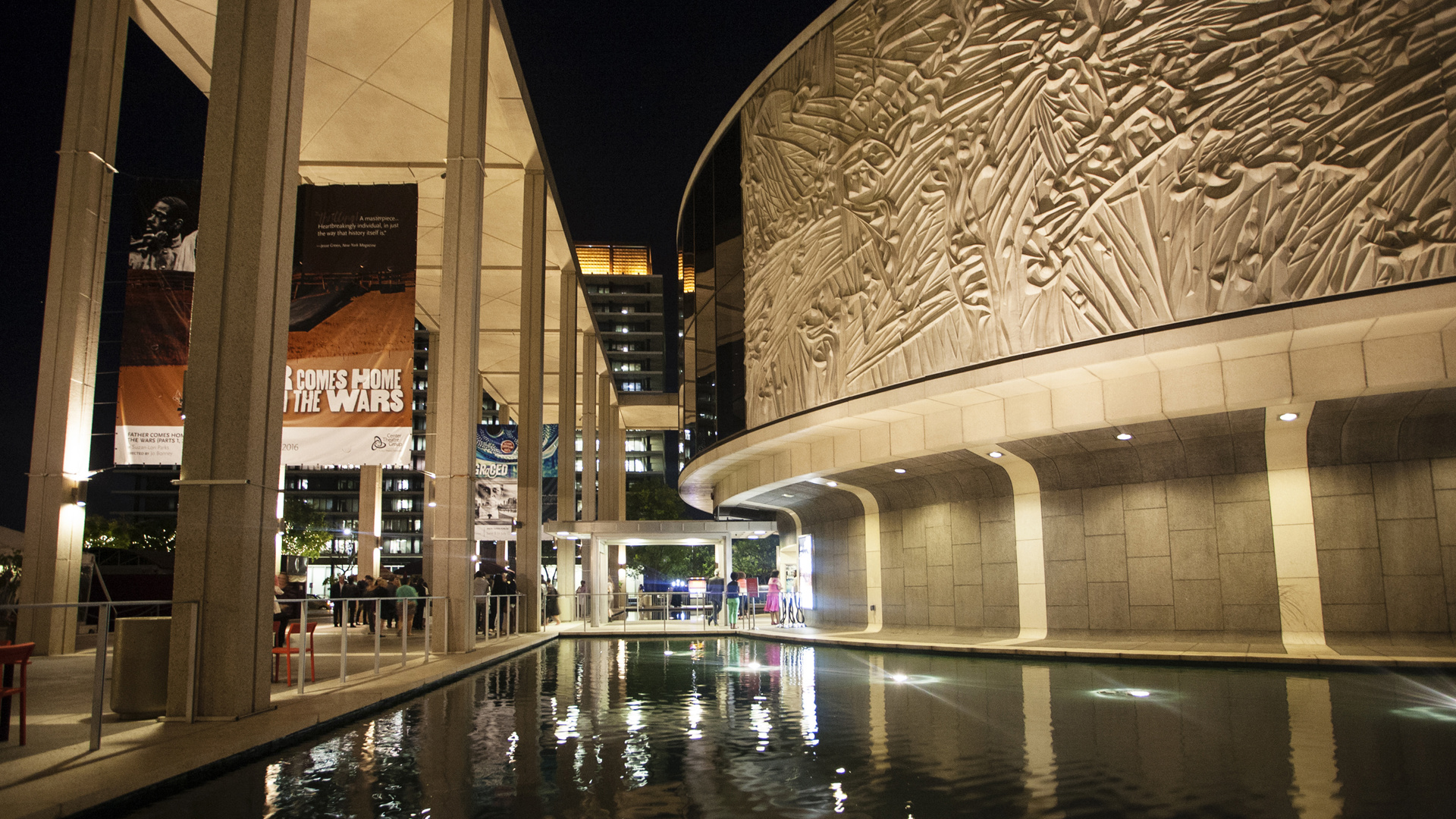 A night view of the Mark Taper Forum Theatre and it's reflection pool. 