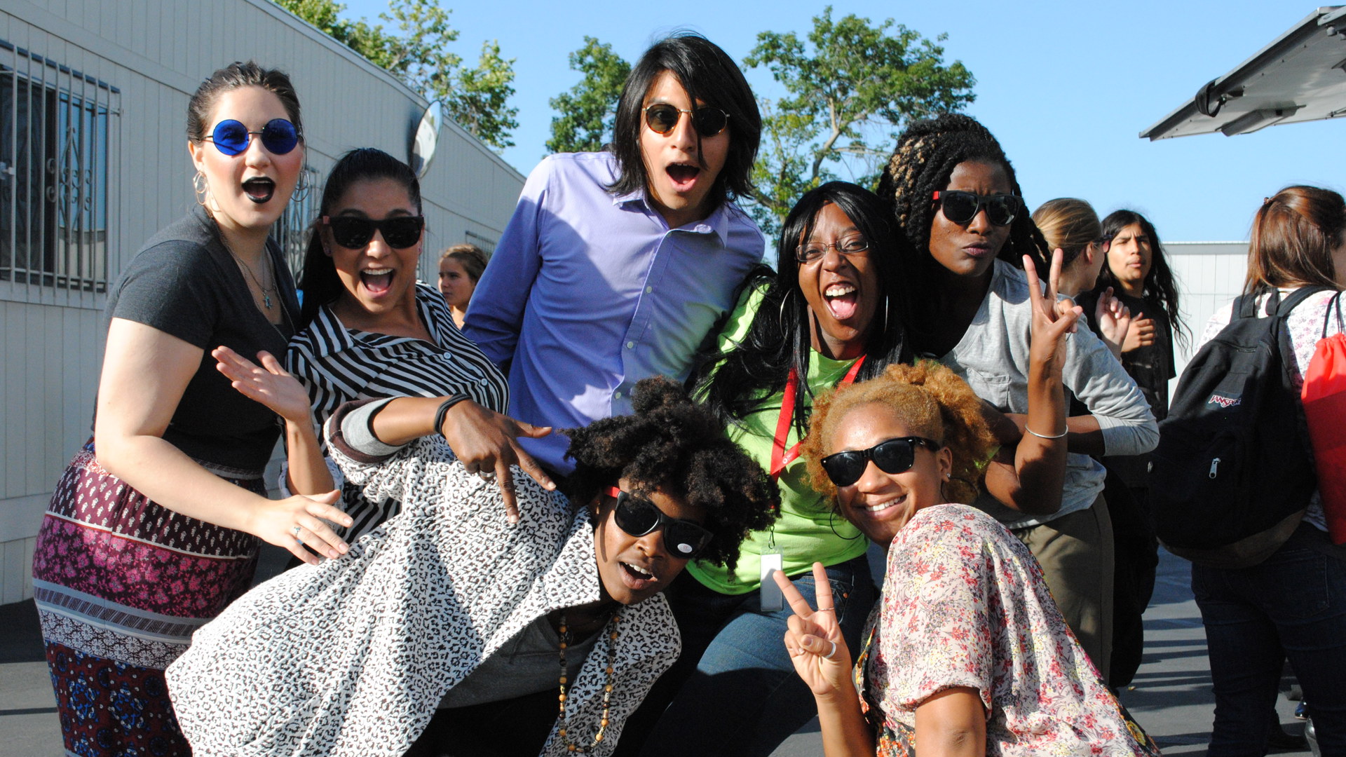 A group photo with 7 individuals at the Annex during an event.