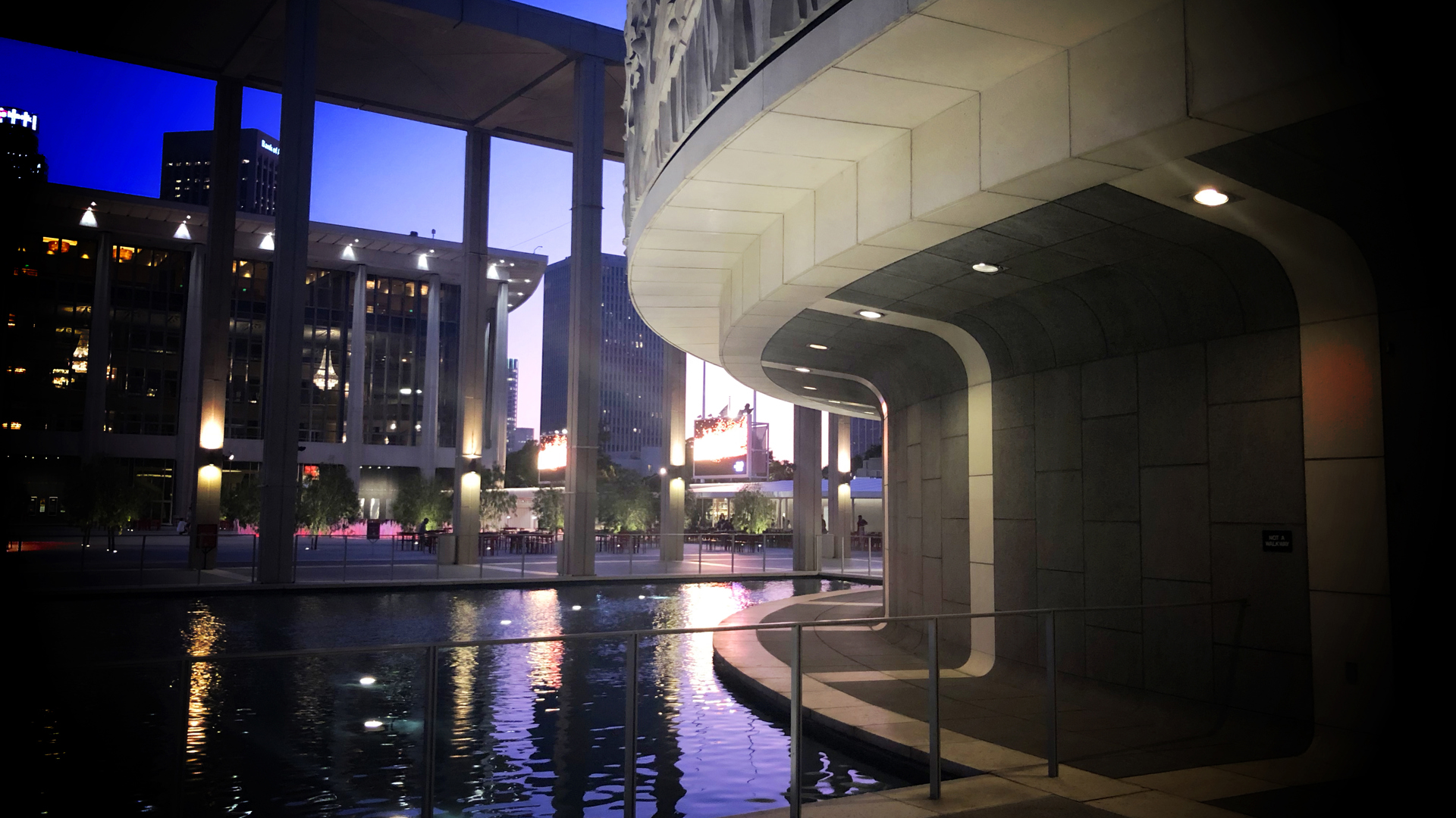 Exterior of the Mark Taper Forum featuring the reflecting pool. 